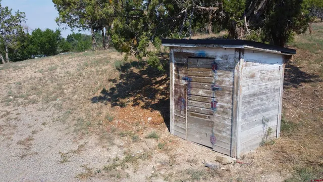 an aerial view of a fireplace with a yard