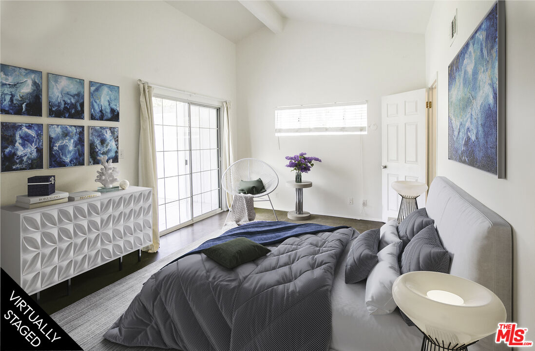 6557 Wandermere Road, Unit GH Malibu, CA 90265 - Photo 13 of 17 a bedroom with a bed and a couch