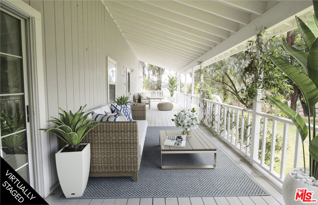6557 Wandermere Road, Unit GH Malibu, CA 90265 - Photo 5 of 17 a living room with furniture