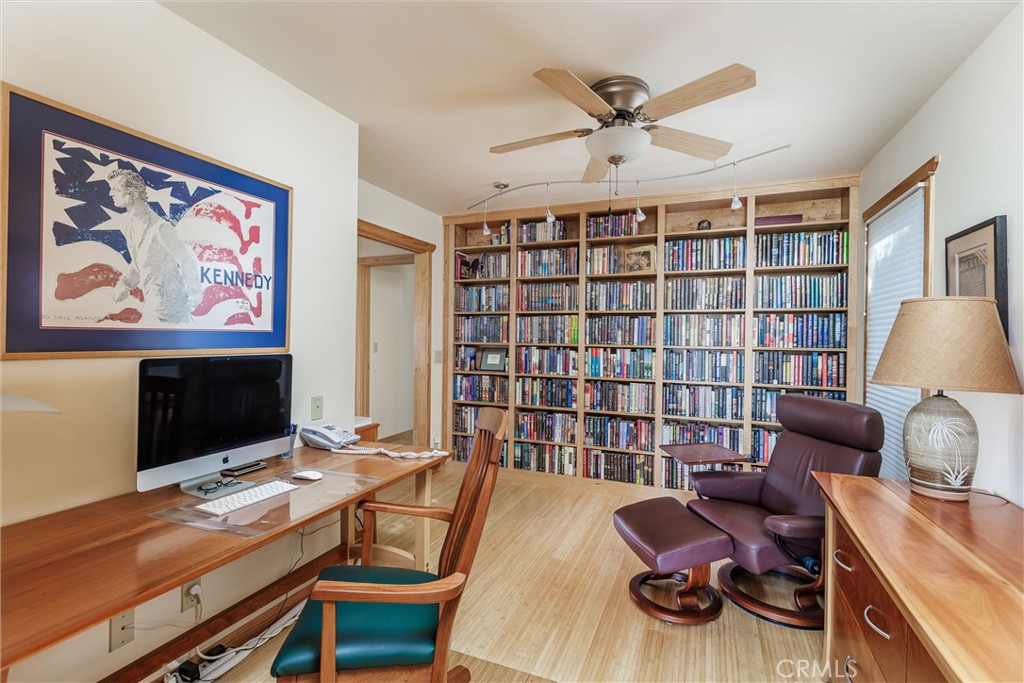 10 11th Street Cayucos, CA 93430 - Photo 19 of 33 a work room with furniture and wooden floor