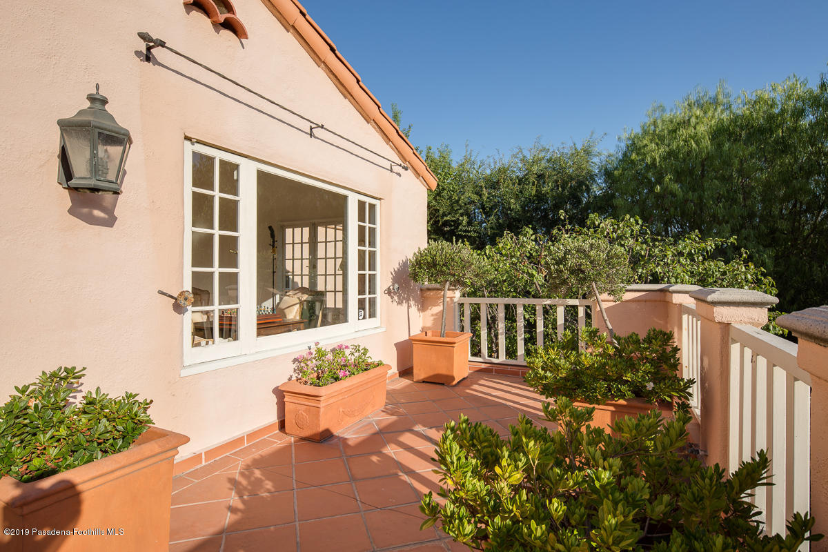 104 Club Road Pasadena, CA 91105 - Photo 15 of 43 a balcony with outdoor seating and plants
