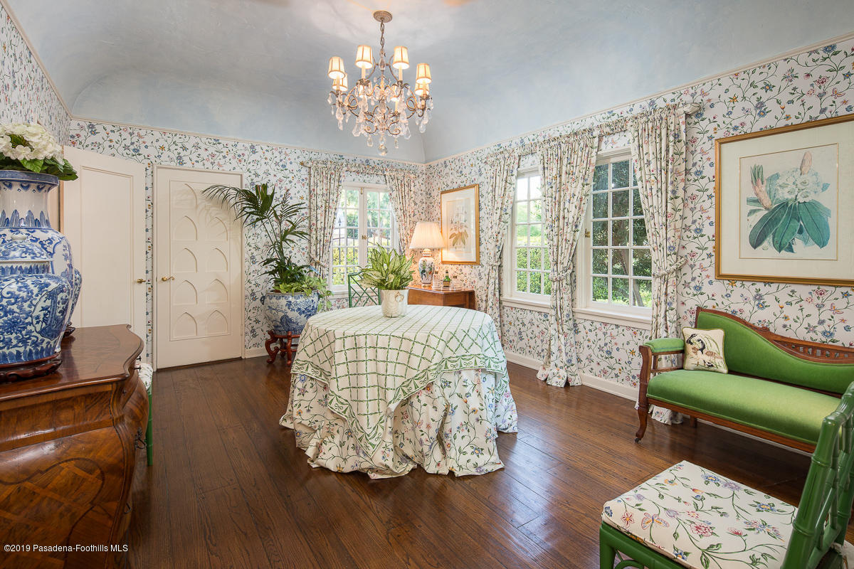 104 Club Road Pasadena, CA 91105 - Photo 18 of 43 a living room with furniture and a chandelier
