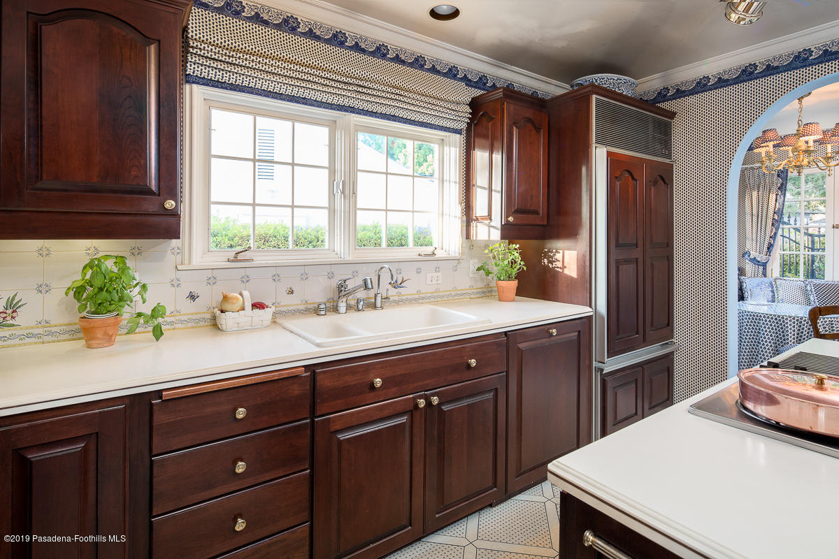 104 Club Road Pasadena, CA 91105 - Photo 21 of 43 a kitchen with a sink and a window