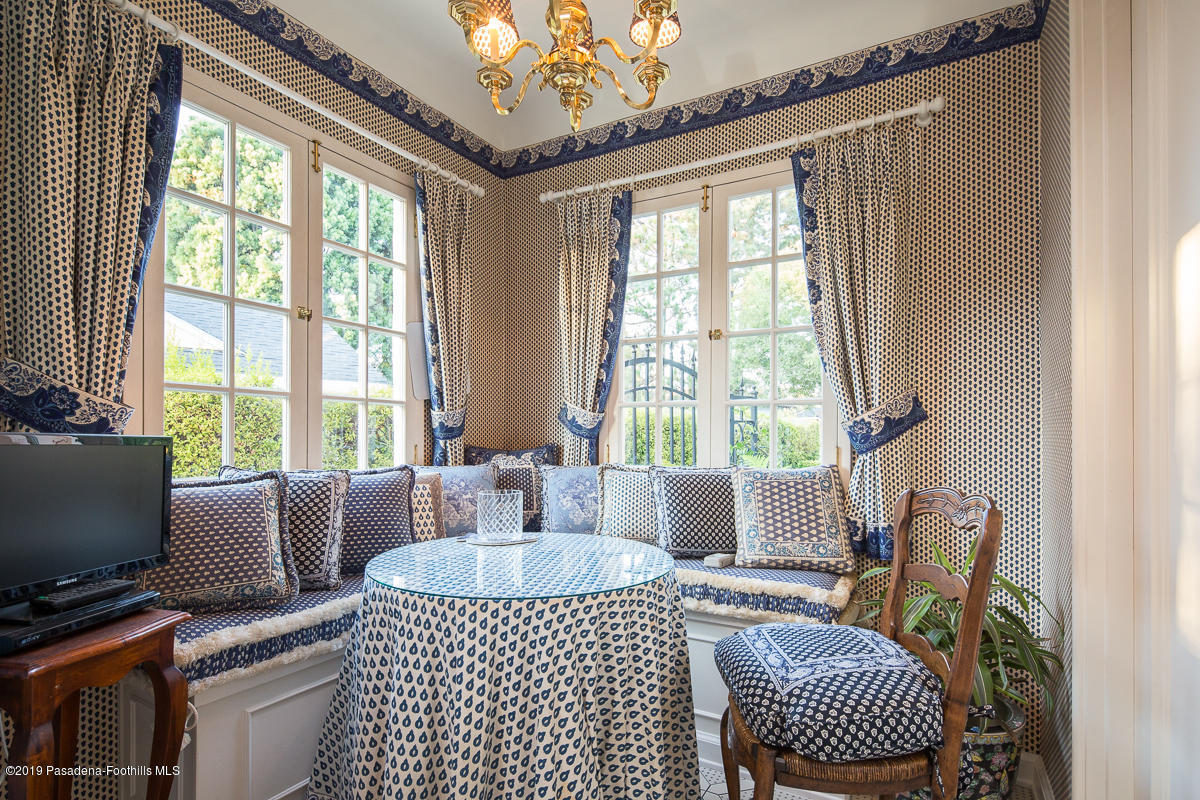 104 Club Road Pasadena, CA 91105 - Photo 23 of 43 a living room with furniture and a floor to ceiling window