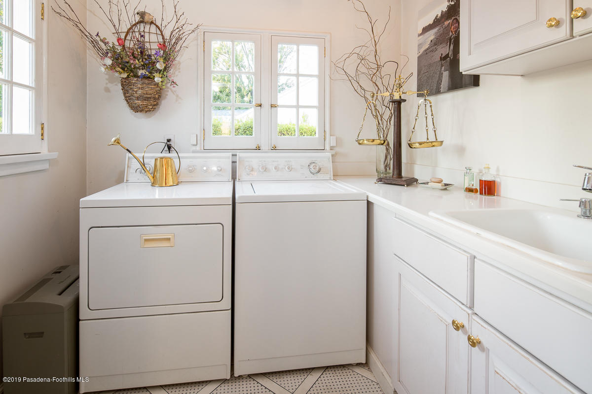 104 Club Road Pasadena, CA 91105 - Photo 24 of 43 a utility room with dryer and washer