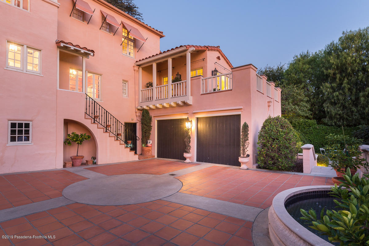 104 Club Road Pasadena, CA 91105 - Photo 39 of 43 a front view of a house with lots of green space and plants
