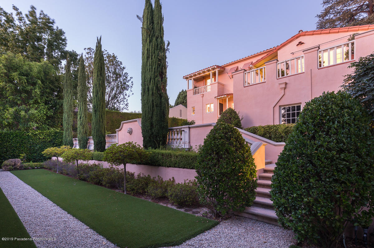 104 Club Road Pasadena, CA 91105 - Photo 42 of 43 a front view of a house with a yard and garage