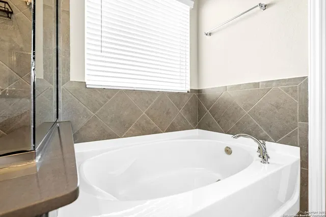 a bathroom with a bathtub