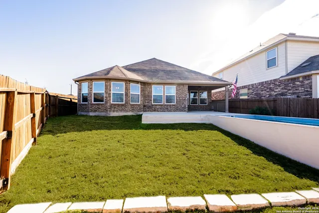 a view of a lake with a garden