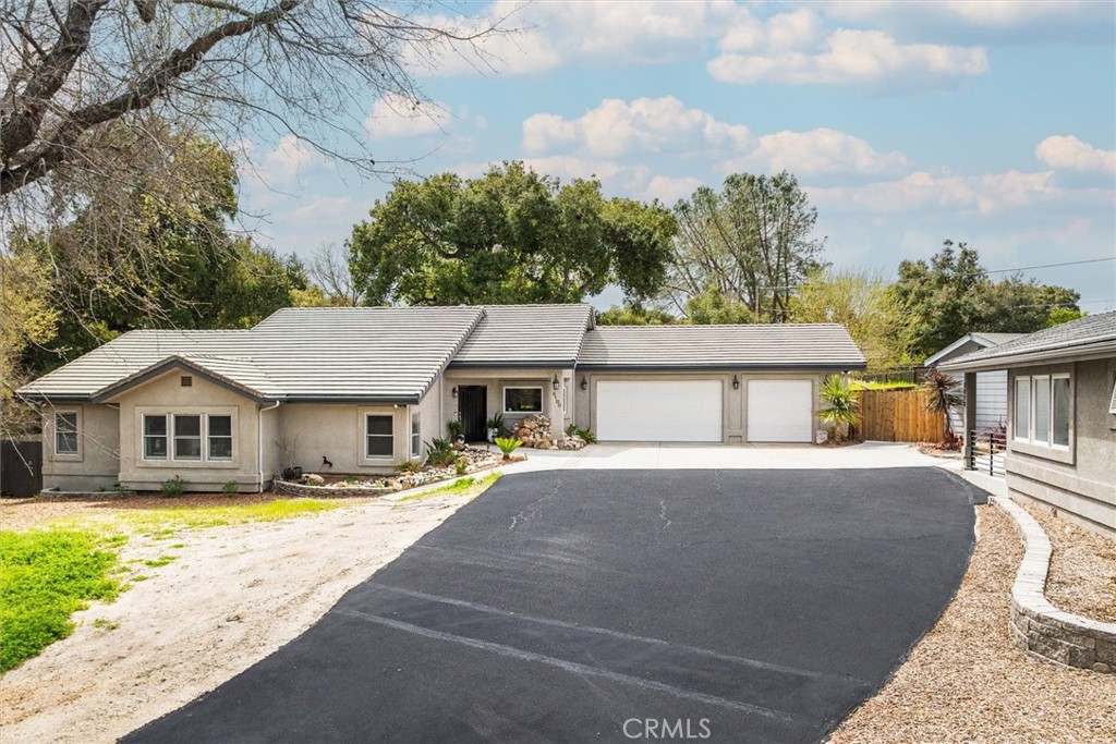 8100 Coromar Avenue Atascadero, CA 93422 - Photo 2 of 69 Private entry yard, plenty of parking. Fresh seal coat on driveway.
