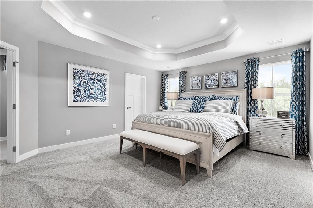 130 Olivia Drive Eighty Four, PA 15330 - Photo 16 of 27 a bedroom with a bed and a painting