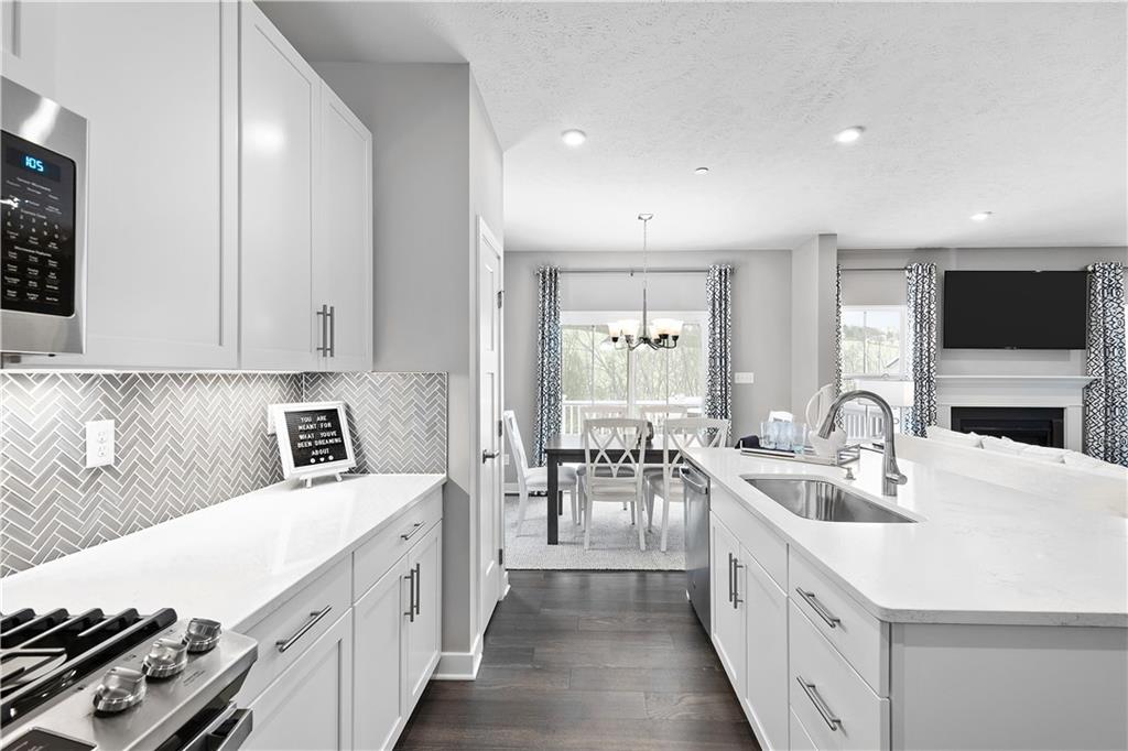 130 Olivia Drive Eighty Four, PA 15330 - Photo 5 of 27 a kitchen with sink stove top oven and refrigerator