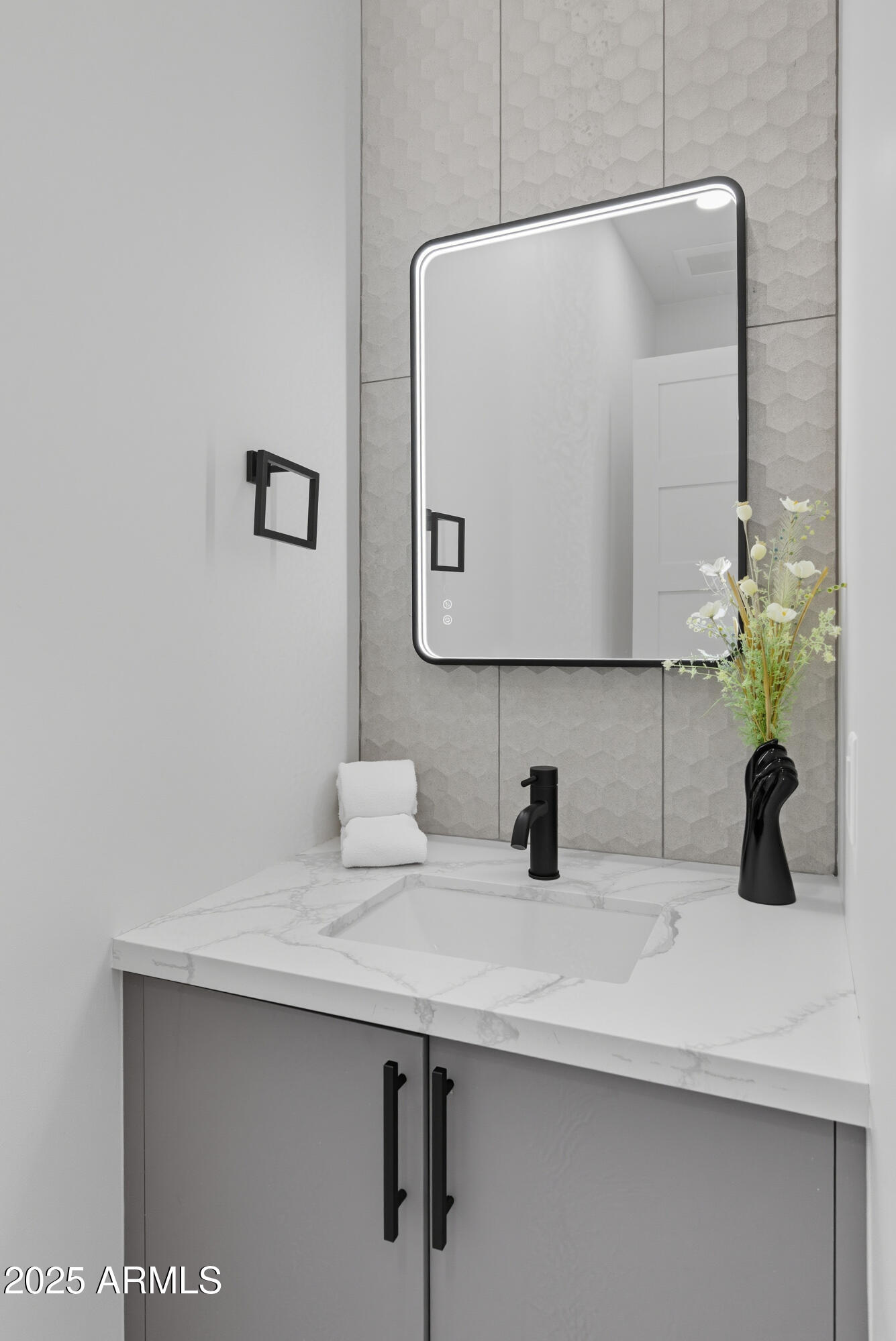 1501 North Miller Road, Unit 1015 Scottsdale, AZ 85257 - Photo 20 of 50 a bathroom with a sink and a mirror
