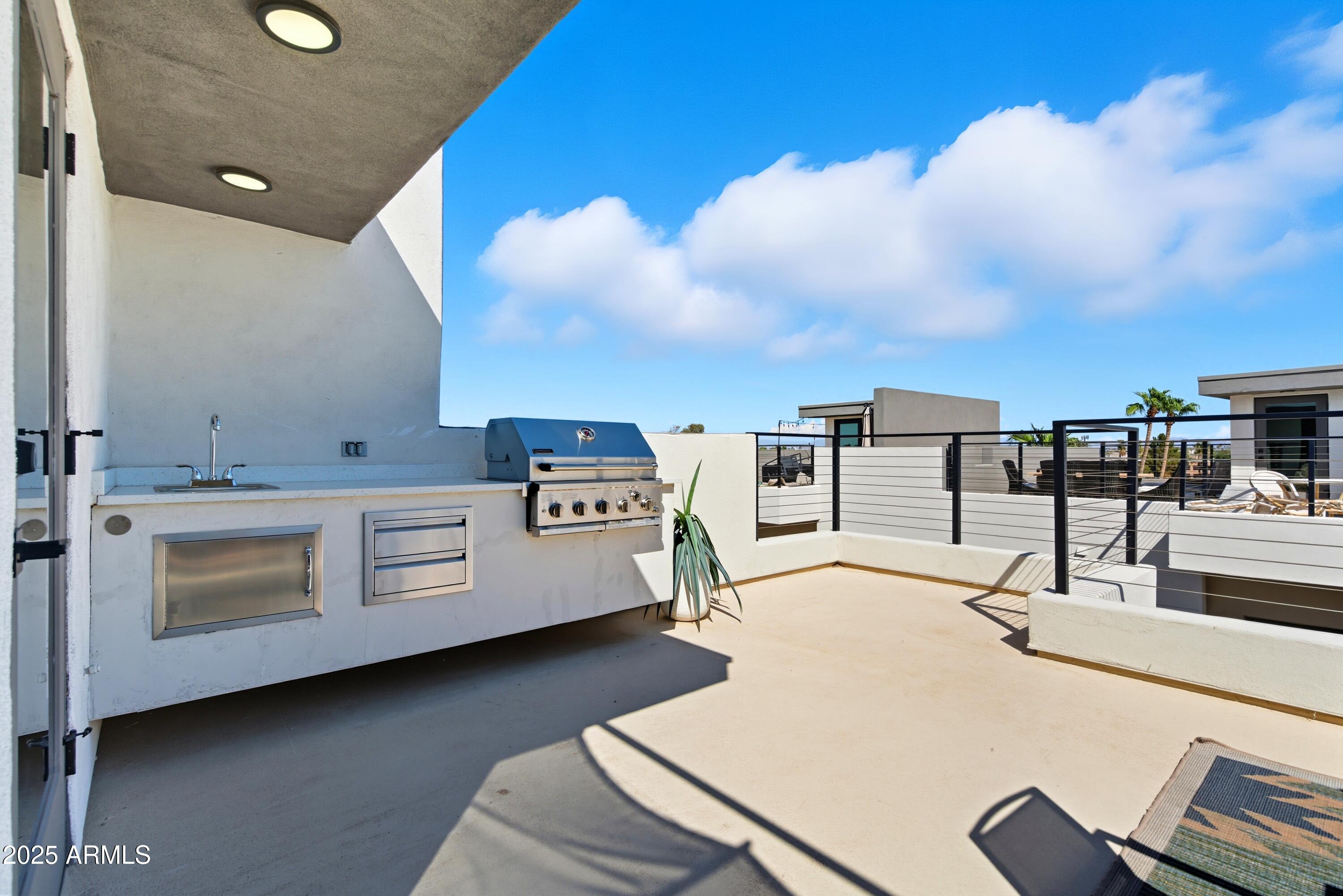 1501 North Miller Road, Unit 1015 Scottsdale, AZ 85257 - Photo 41 of 50 a living room with furniture