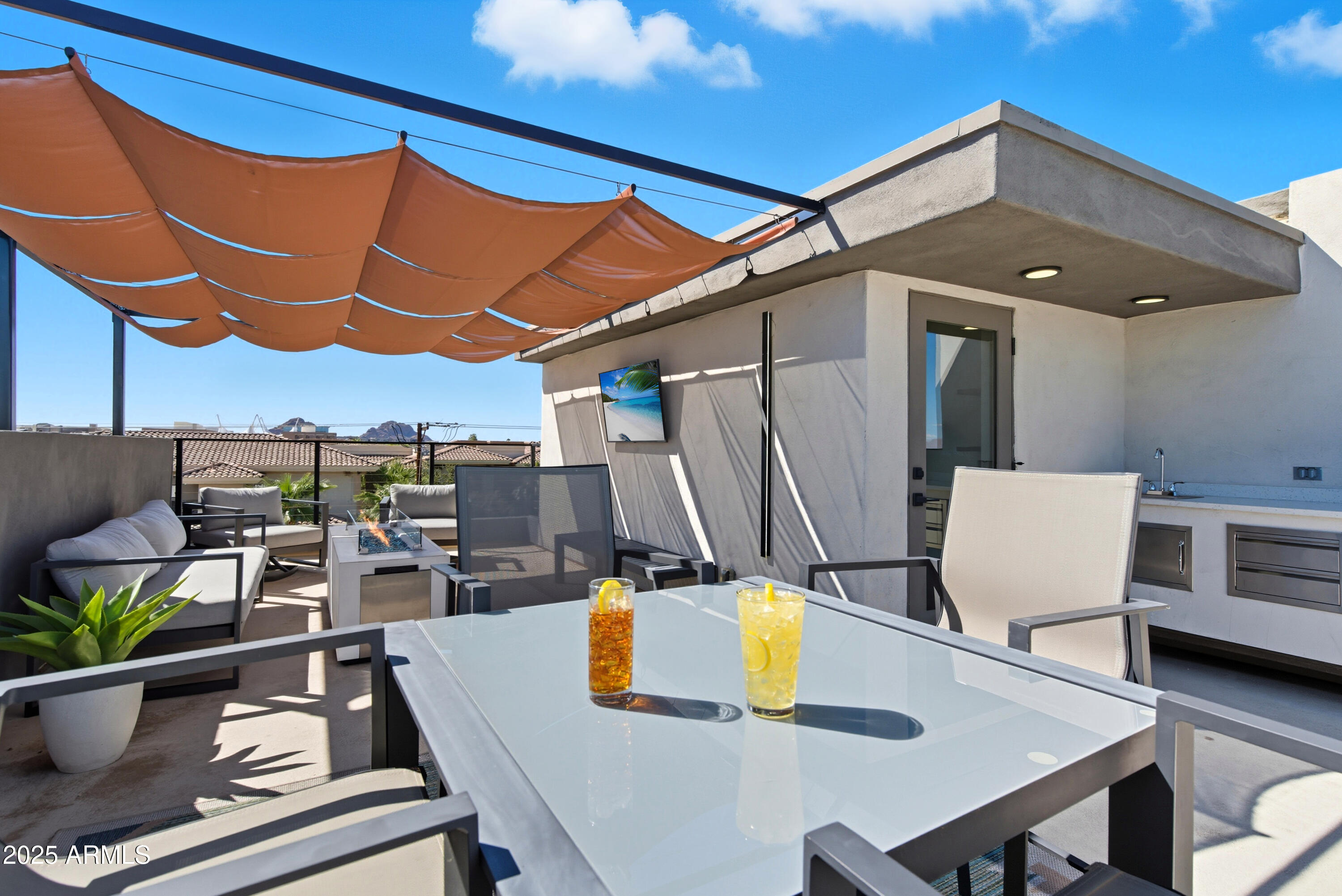 1501 North Miller Road, Unit 1015 Scottsdale, AZ 85257 - Photo 45 of 50 a view of an outdoor space with seating area