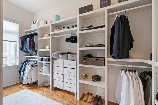 a bathroom with a tub and sink