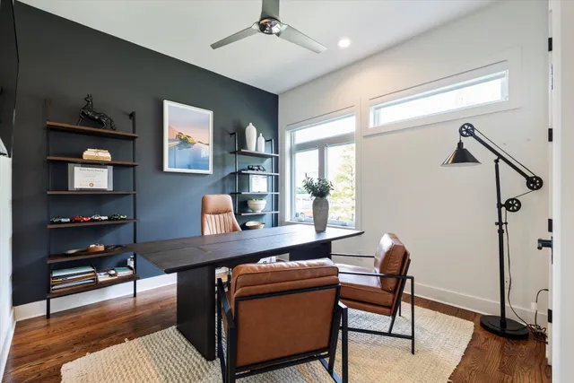 a view of a workspace with furniture