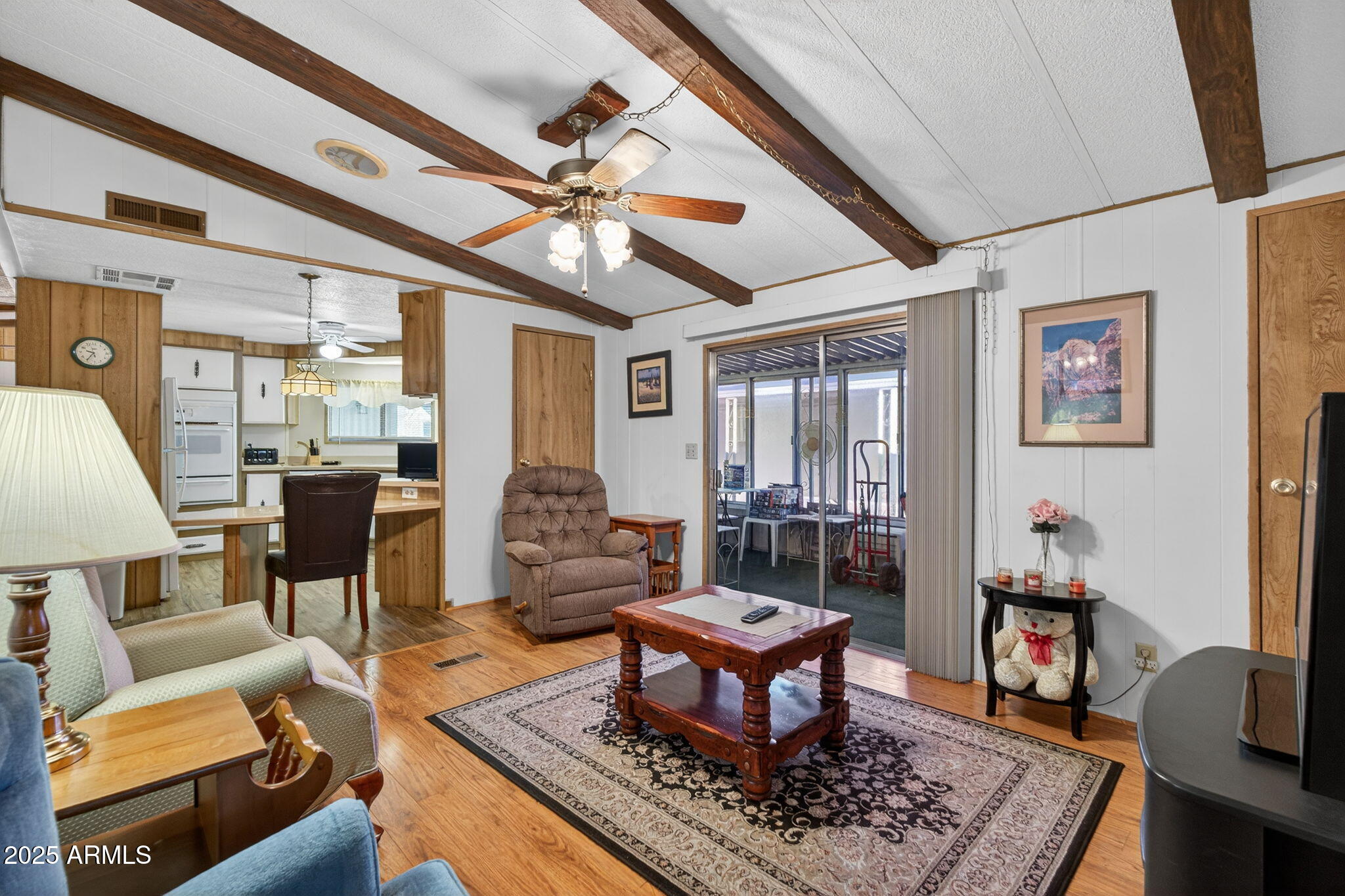 2100 North Trekell Road, Unit 131 Casa Grande, AZ 85122 - Photo 15 of 46 a living room with furniture and a large window