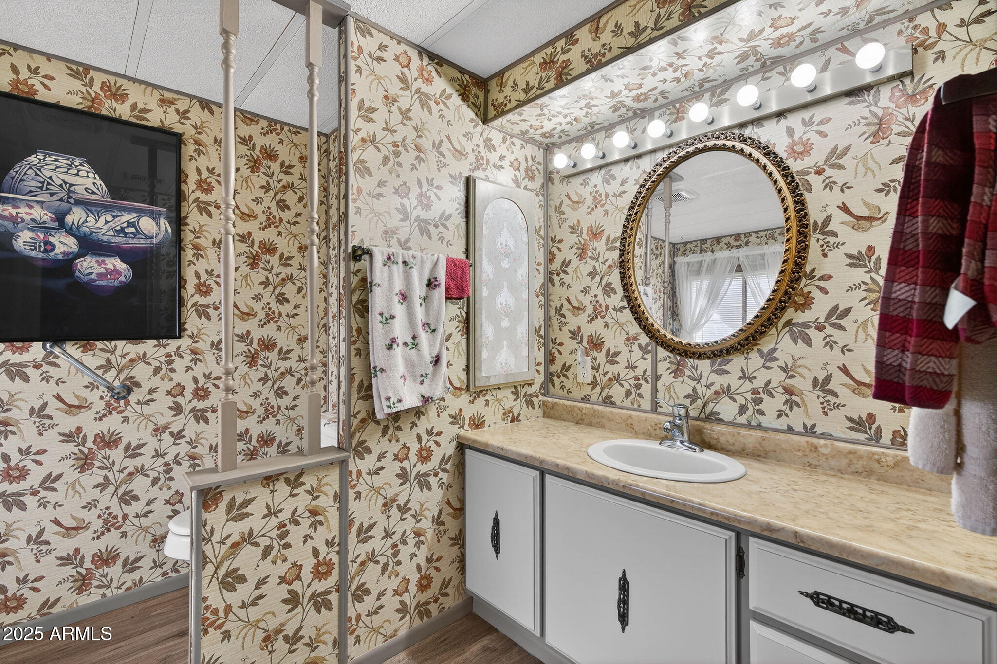2100 North Trekell Road, Unit 131 Casa Grande, AZ 85122 - Photo 19 of 46 a bathroom with a sink vanity mirror and shower