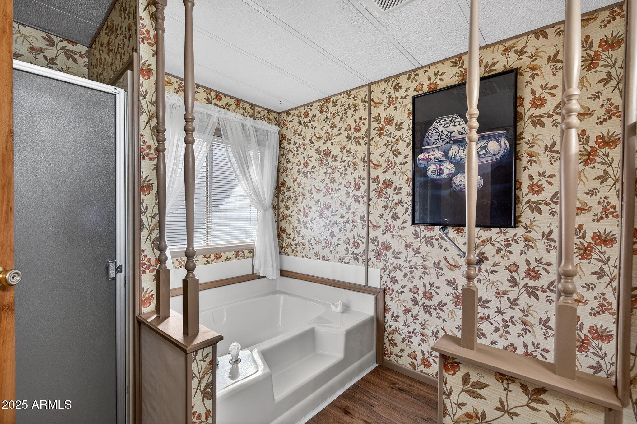 2100 North Trekell Road, Unit 131 Casa Grande, AZ 85122 - Photo 20 of 46 a bathroom with a bathtub and shower