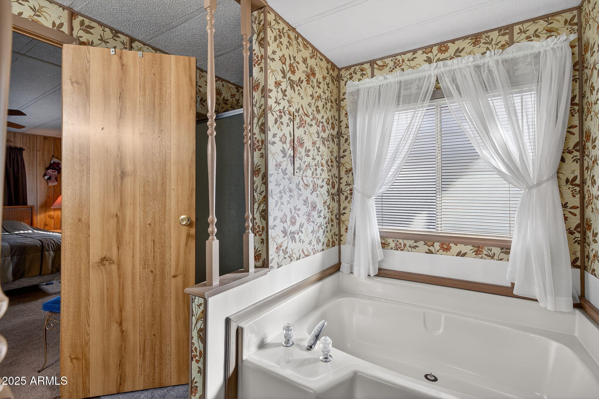 2100 North Trekell Road, Unit 131 Casa Grande, AZ 85122 - Photo 22 of 46 a bathroom with a bathtub and a shower