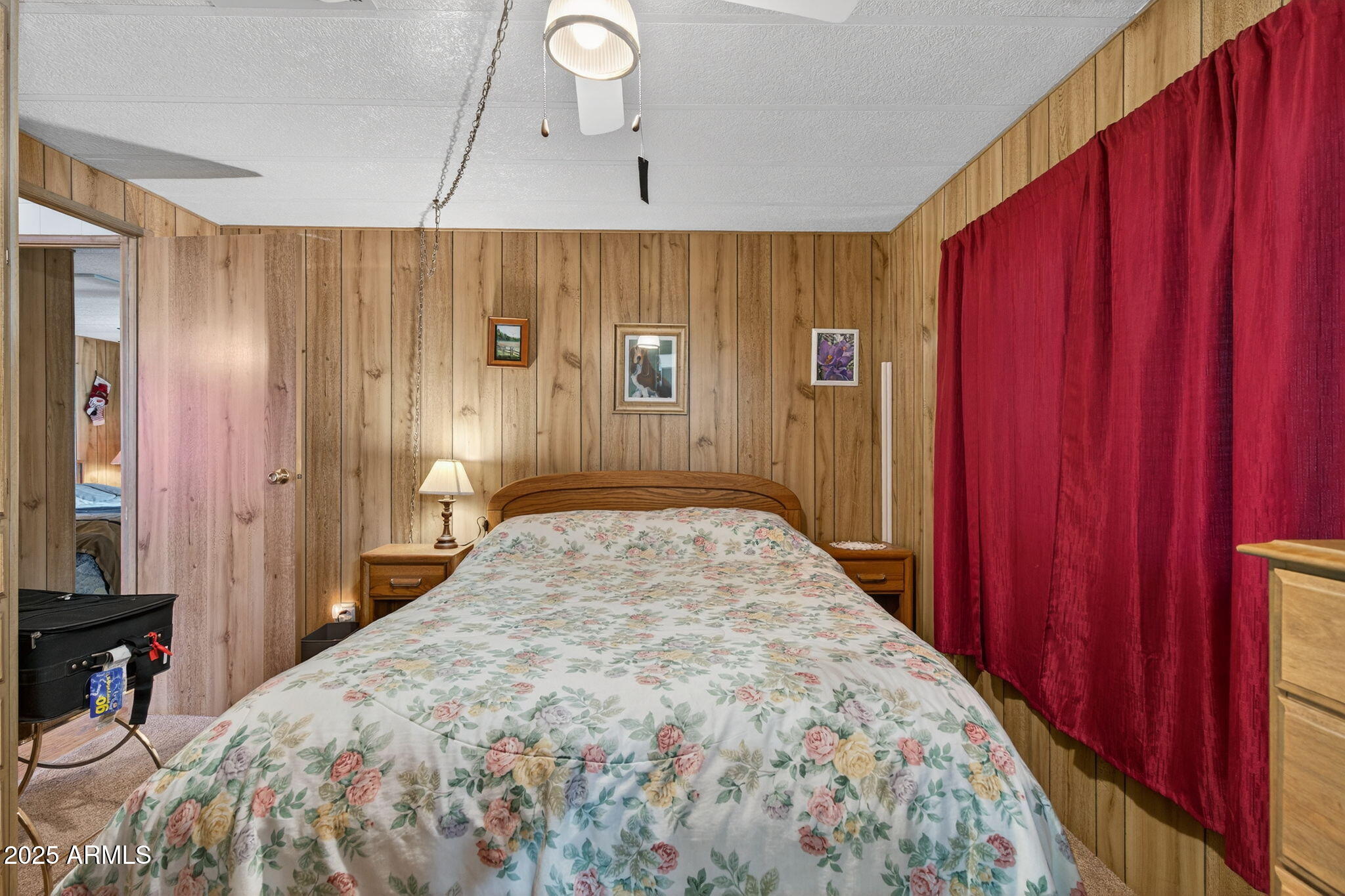 2100 North Trekell Road, Unit 131 Casa Grande, AZ 85122 - Photo 23 of 46 a spacious bedroom with a bed and a mirror
