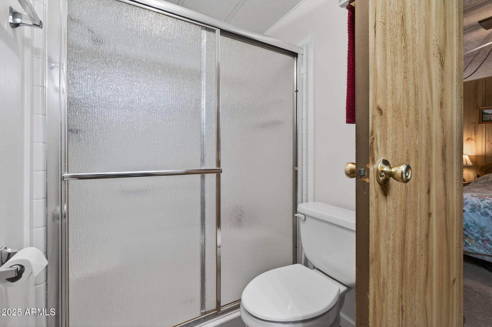 2100 North Trekell Road, Unit 131 Casa Grande, AZ 85122 - Photo 26 of 46 a white toilet sitting next to a bathroom sink