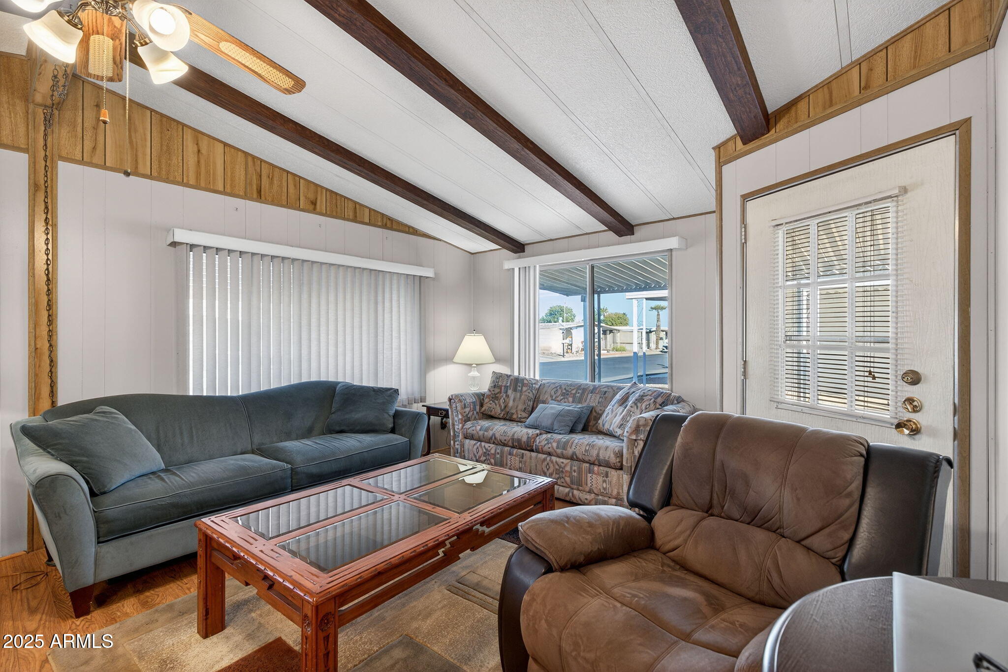 2100 North Trekell Road, Unit 131 Casa Grande, AZ 85122 - Photo 31 of 46 a living room with furniture a couch and windows