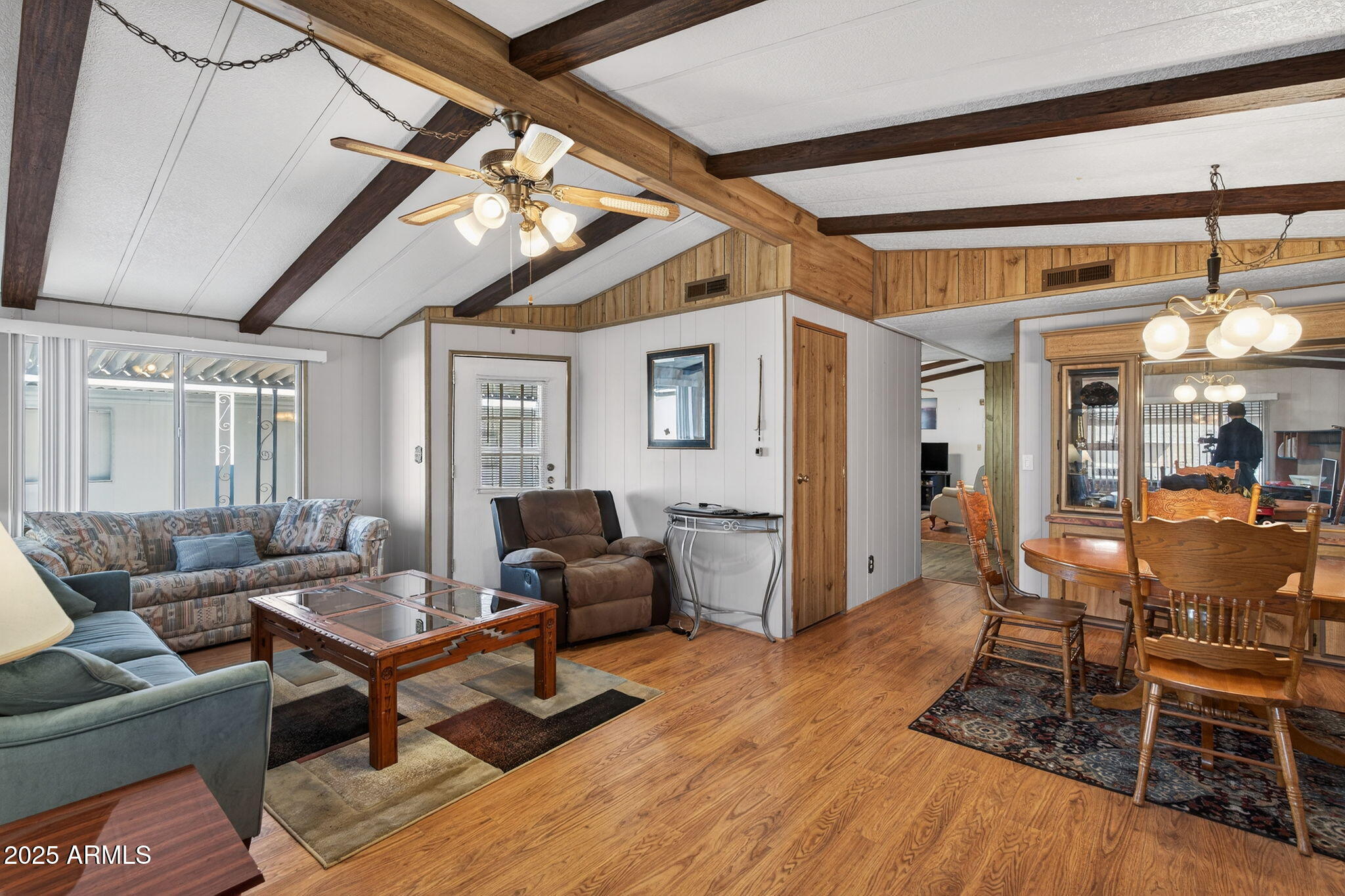 2100 North Trekell Road, Unit 131 Casa Grande, AZ 85122 - Photo 35 of 46 a living room with furniture and wooden floor