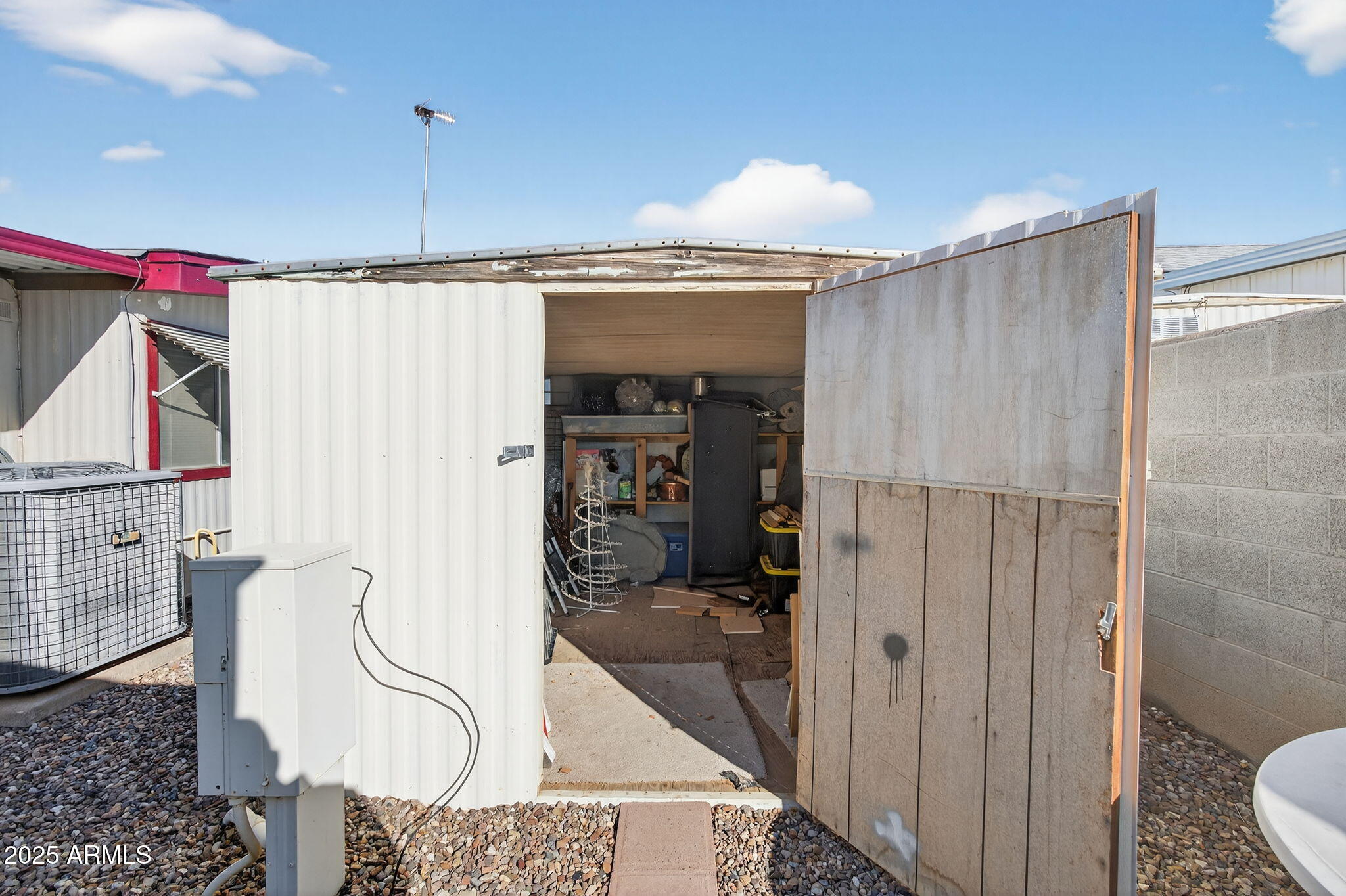 2100 North Trekell Road, Unit 131 Casa Grande, AZ 85122 - Photo 37 of 46 a bathroom with a granite countertop sink a toilet and shower