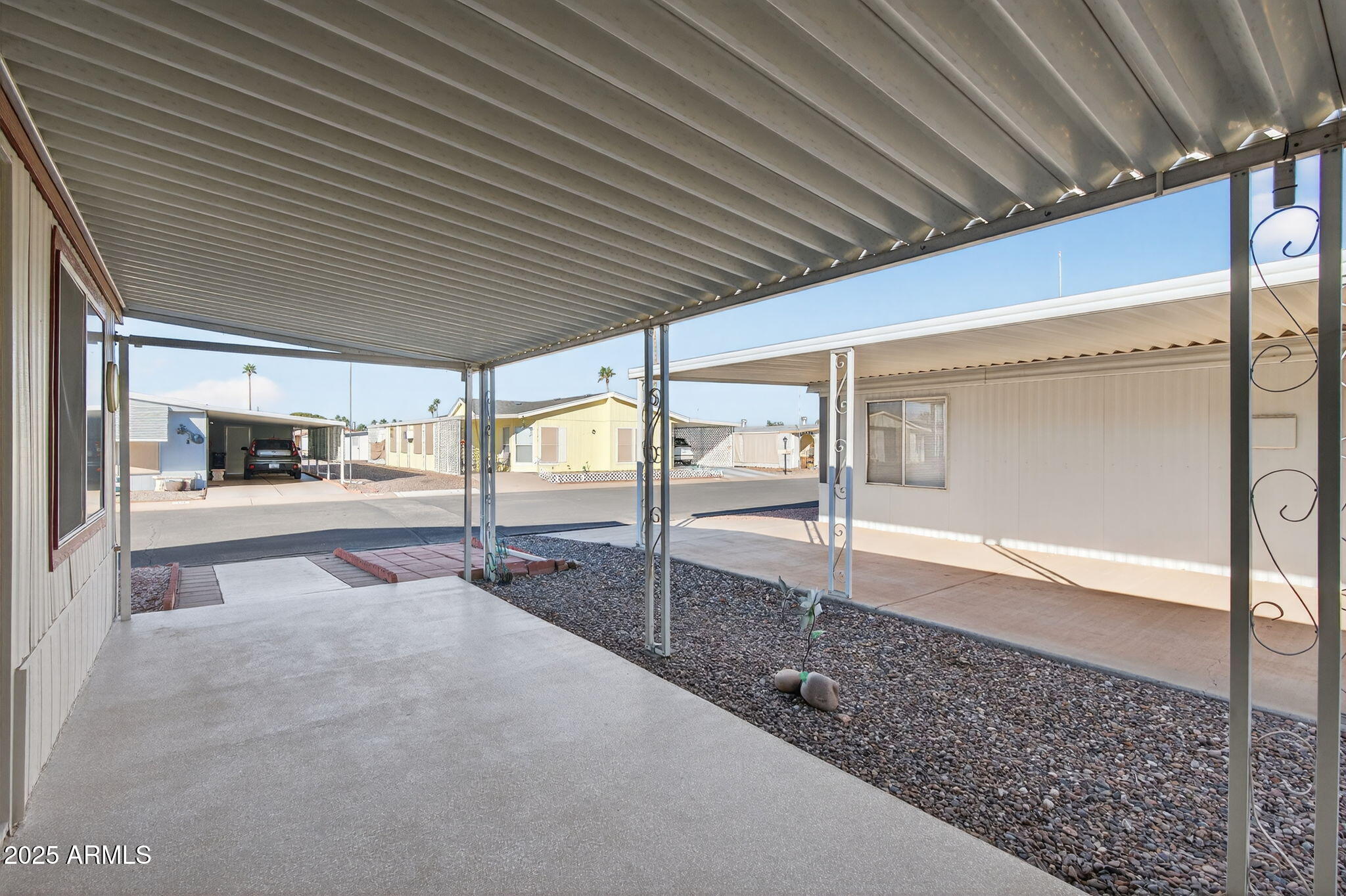 2100 North Trekell Road, Unit 131 Casa Grande, AZ 85122 - Photo 43 of 46 a swimming pool with an outdoor seating yard and livingroom