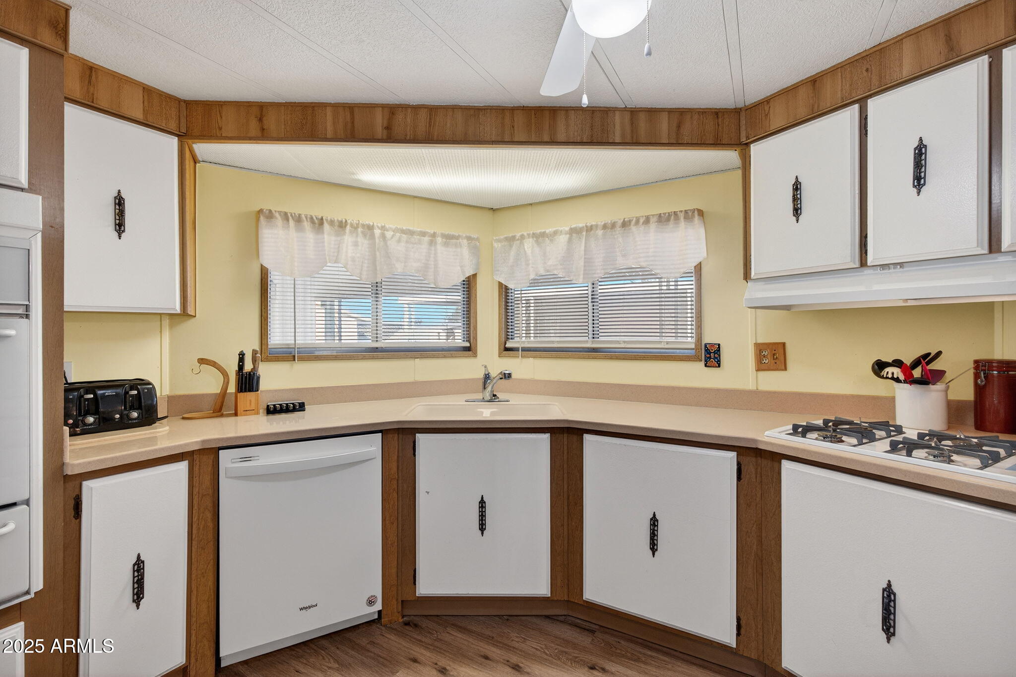 2100 North Trekell Road, Unit 131 Casa Grande, AZ 85122 - Photo 10 of 46 a kitchen with a sink cabinets and window