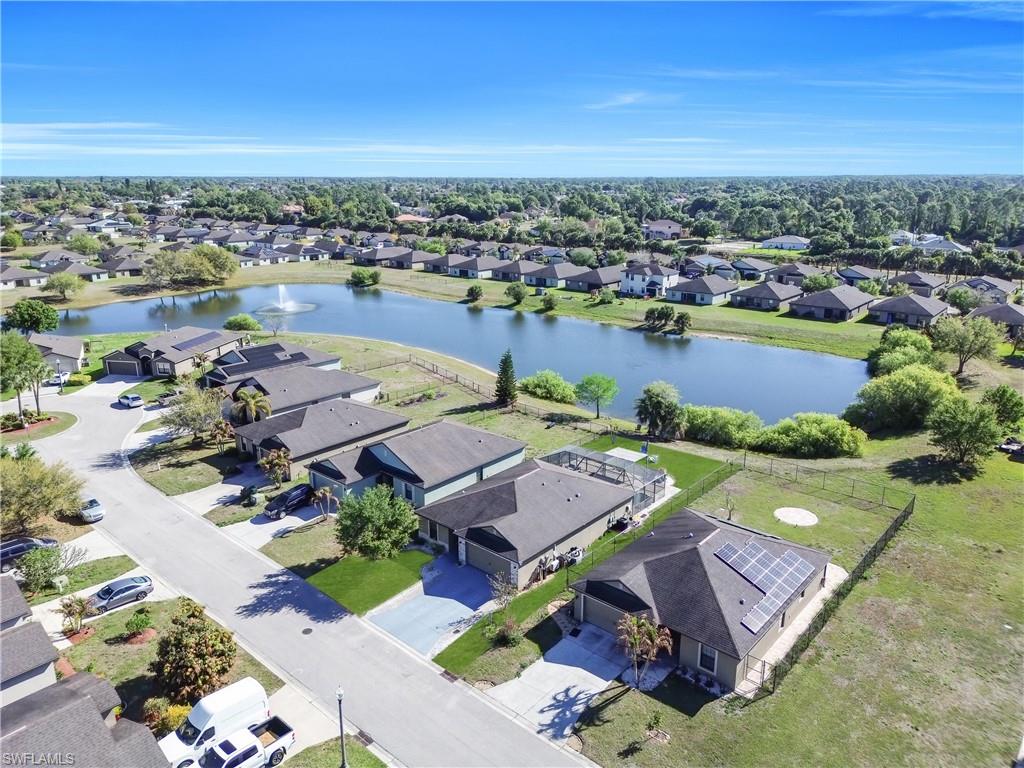 175 Shadowview Court Lehigh Acres, FL 33974 - Photo 33 of 39 an aerial view of a house with outdoor space