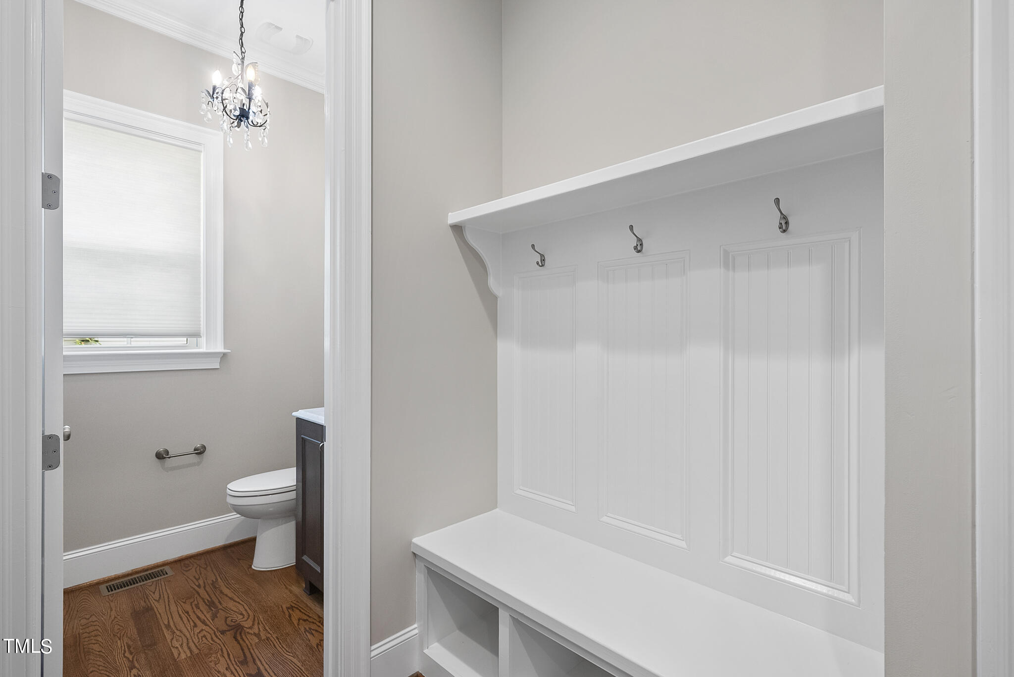 6411 Rosny Road Raleigh, NC 27613 - Photo 21 of 30 a bathroom with a sink a toilet and shower