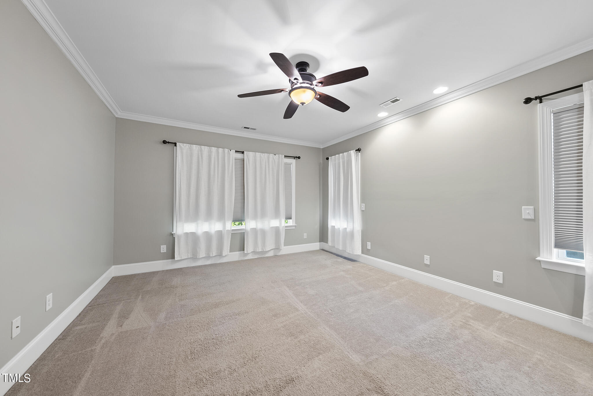 6411 Rosny Road Raleigh, NC 27613 - Photo 23 of 30 a view of an empty room with a window