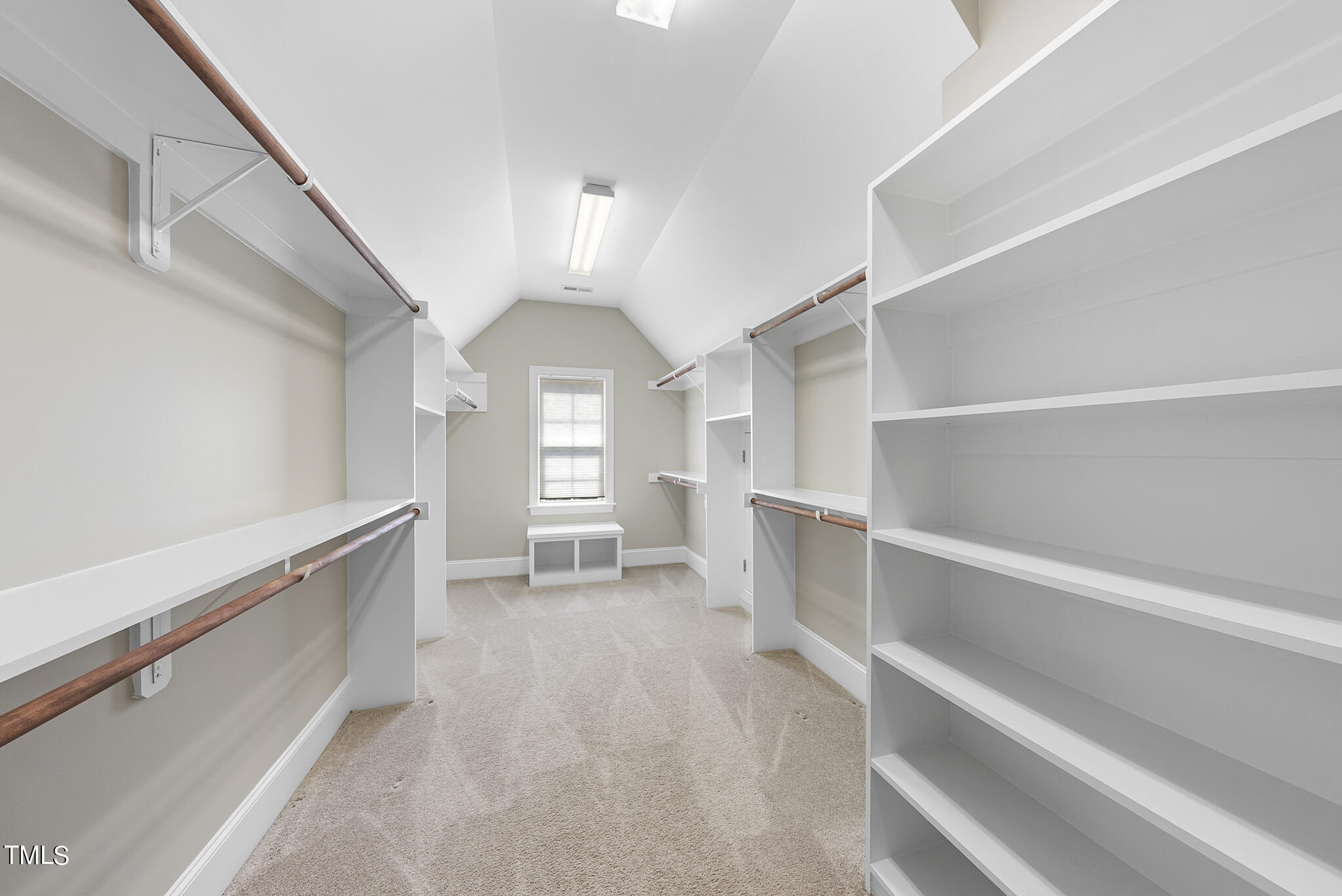 6411 Rosny Road Raleigh, NC 27613 - Photo 29 of 30 a view of a hallway with stairs and chandelier