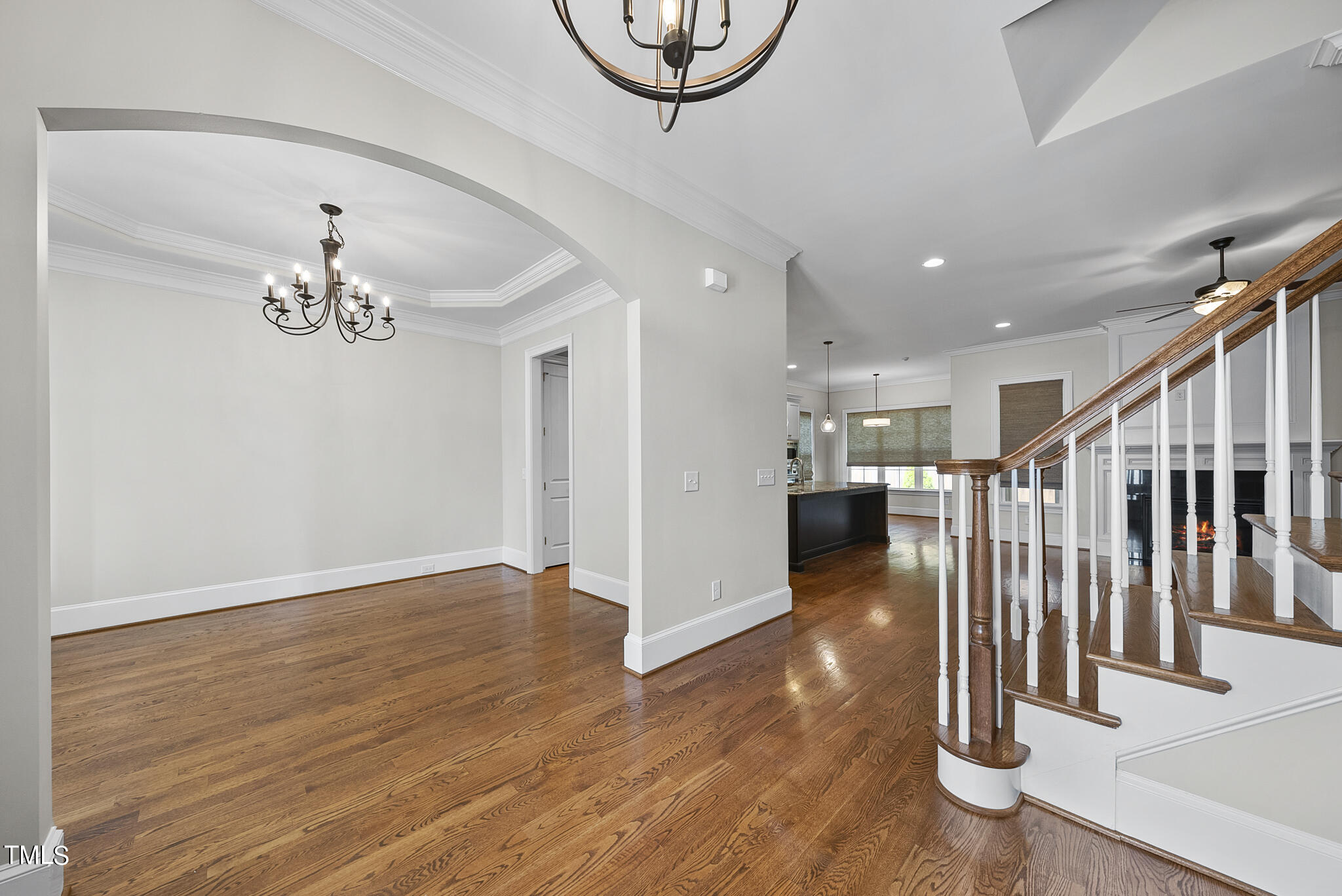 6411 Rosny Road Raleigh, NC 27613 - Photo 4 of 30 a view of entryway and hall with wooden floor
