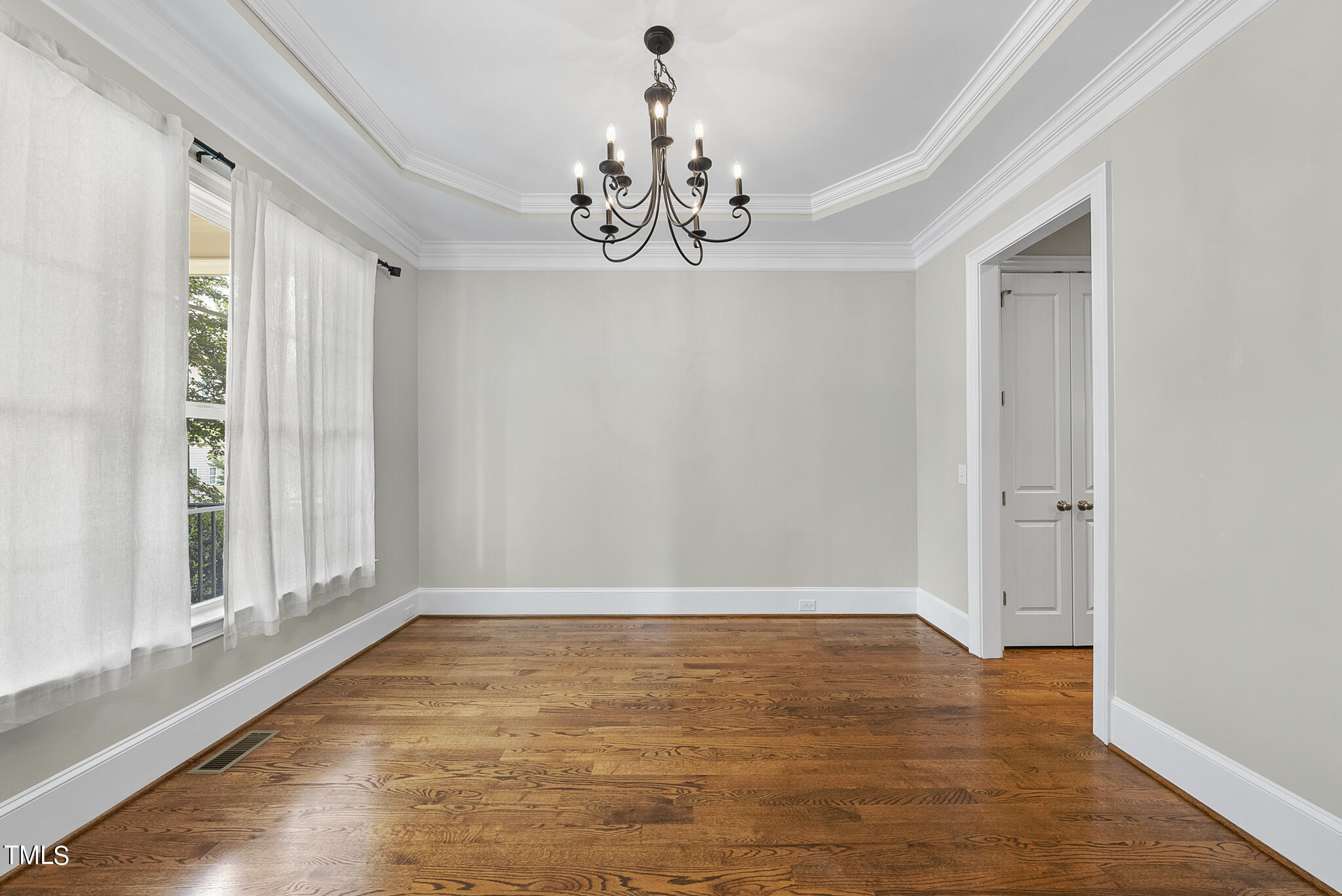 6411 Rosny Road Raleigh, NC 27613 - Photo 5 of 30 a view of an entryway
