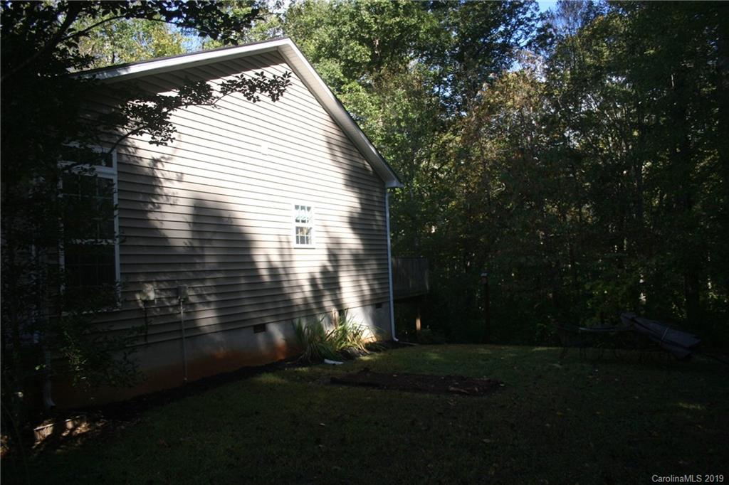 805 Stratford Road Troutman, NC 28166 - Photo 2 of 34 a view of backyard with green space
