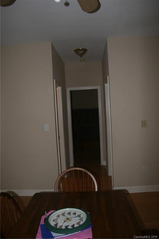 805 Stratford Road Troutman, NC 28166 - Photo 16 of 34 a living room with furniture and a window