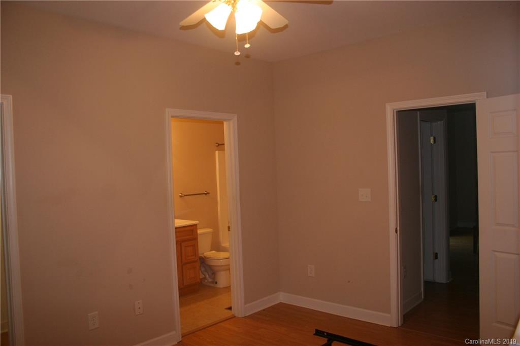 805 Stratford Road Troutman, NC 28166 - Photo 22 of 34 an empty room with a bathroom