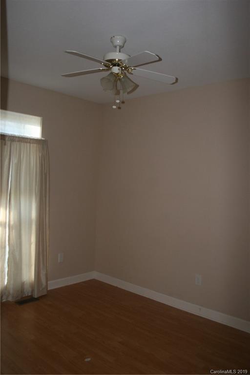 805 Stratford Road Troutman, NC 28166 - Photo 26 of 34 wooden floor in an empty room