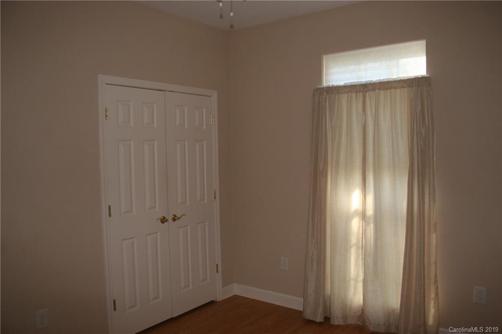 805 Stratford Road Troutman, NC 28166 - Photo 27 of 34 an empty room with window