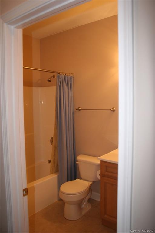 805 Stratford Road Troutman, NC 28166 - Photo 28 of 34 a bathroom with a toilet and a shower