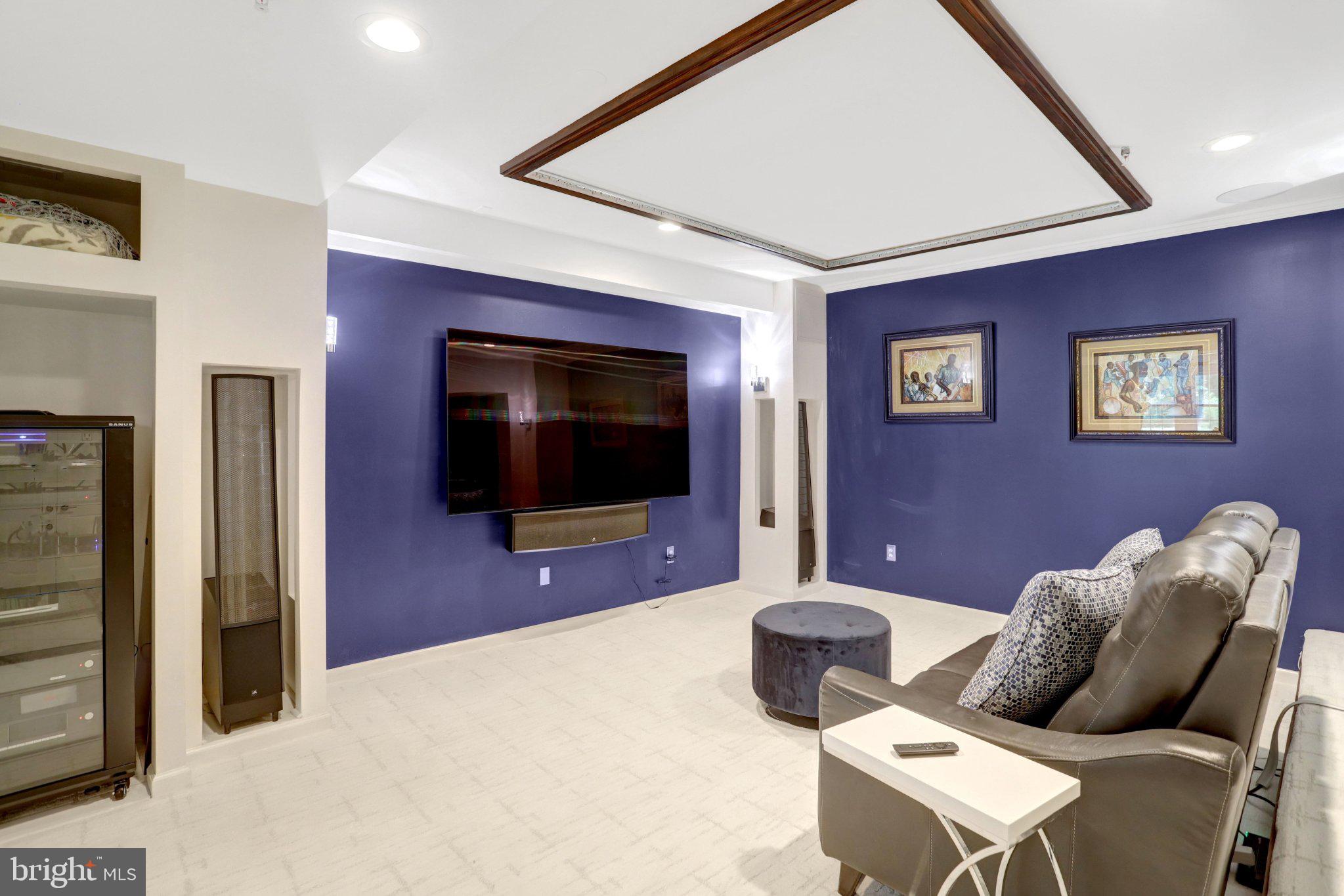 9219 Fort Foote Road Fort Washington, MD 20744 - Photo 52 of 68 Modern theater room with bold accents.