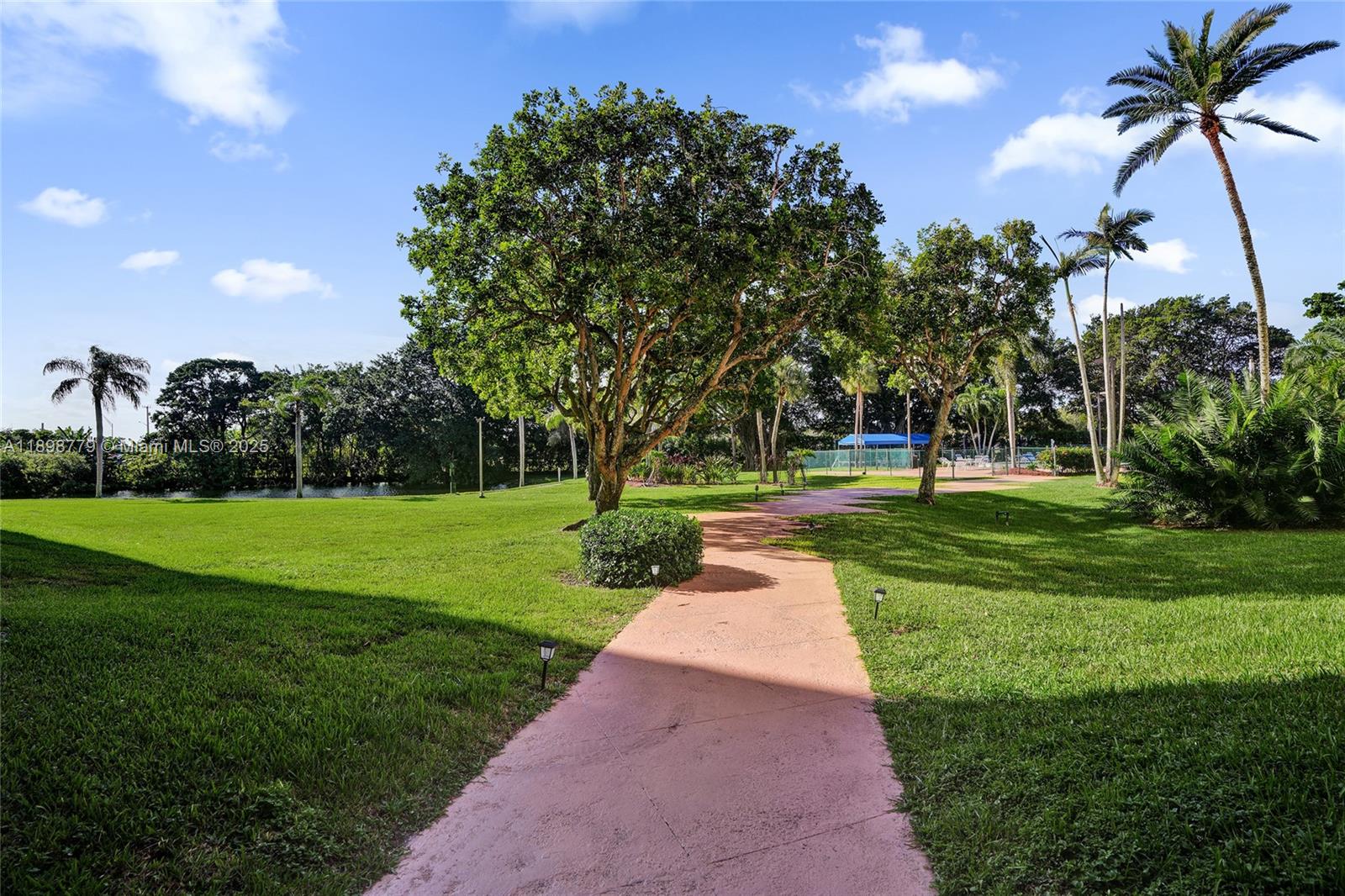 1200 St Charles Place, Unit 413 Pembroke Pines, FL 33026 - Photo 28 of 34 a view of a park with tree s