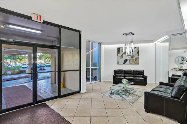 a kitchen with stainless steel appliances granite countertop a refrigerator and a stove