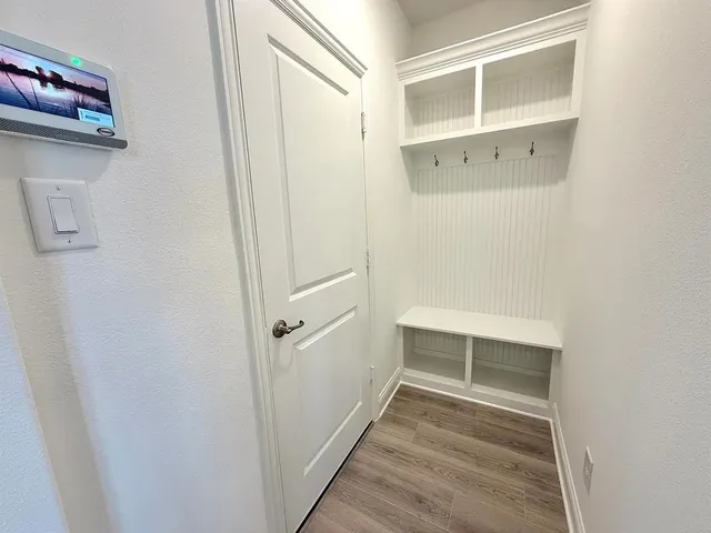 a view of an empty walk in closet
