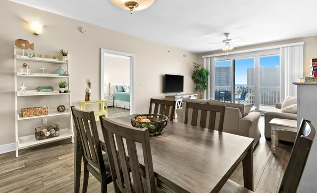 a view of a dining room with furniture window and wooden floor