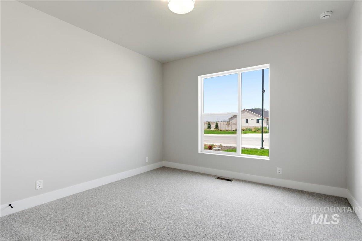 4317 Tropic Way Caldwell, ID 83607 - Photo 26 of 47 Light gray wall-to-wall carpeting with white trim
